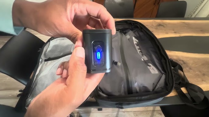 Close-up detail of Black Voyage Zephyr Backpack's premium zippers and reinforced stitching on main compartment